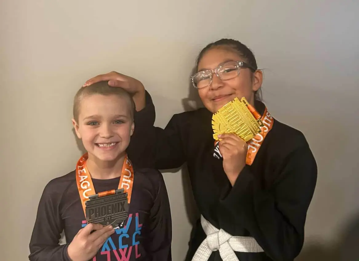 Kids BJJ tournament winners from Dark Matter Jiu-Jitsu serving Gilbert